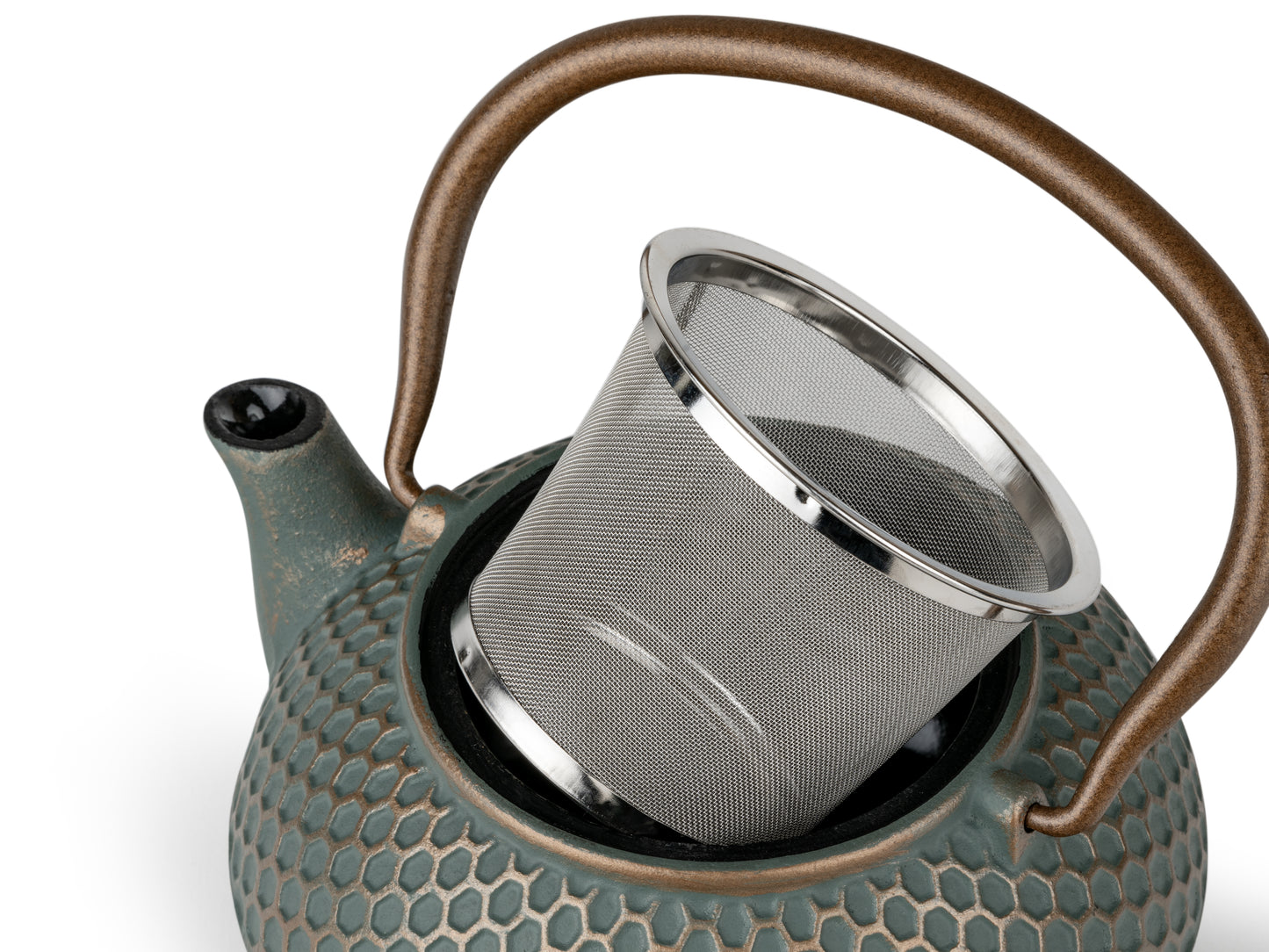 Teapot with a metal filter on a white background