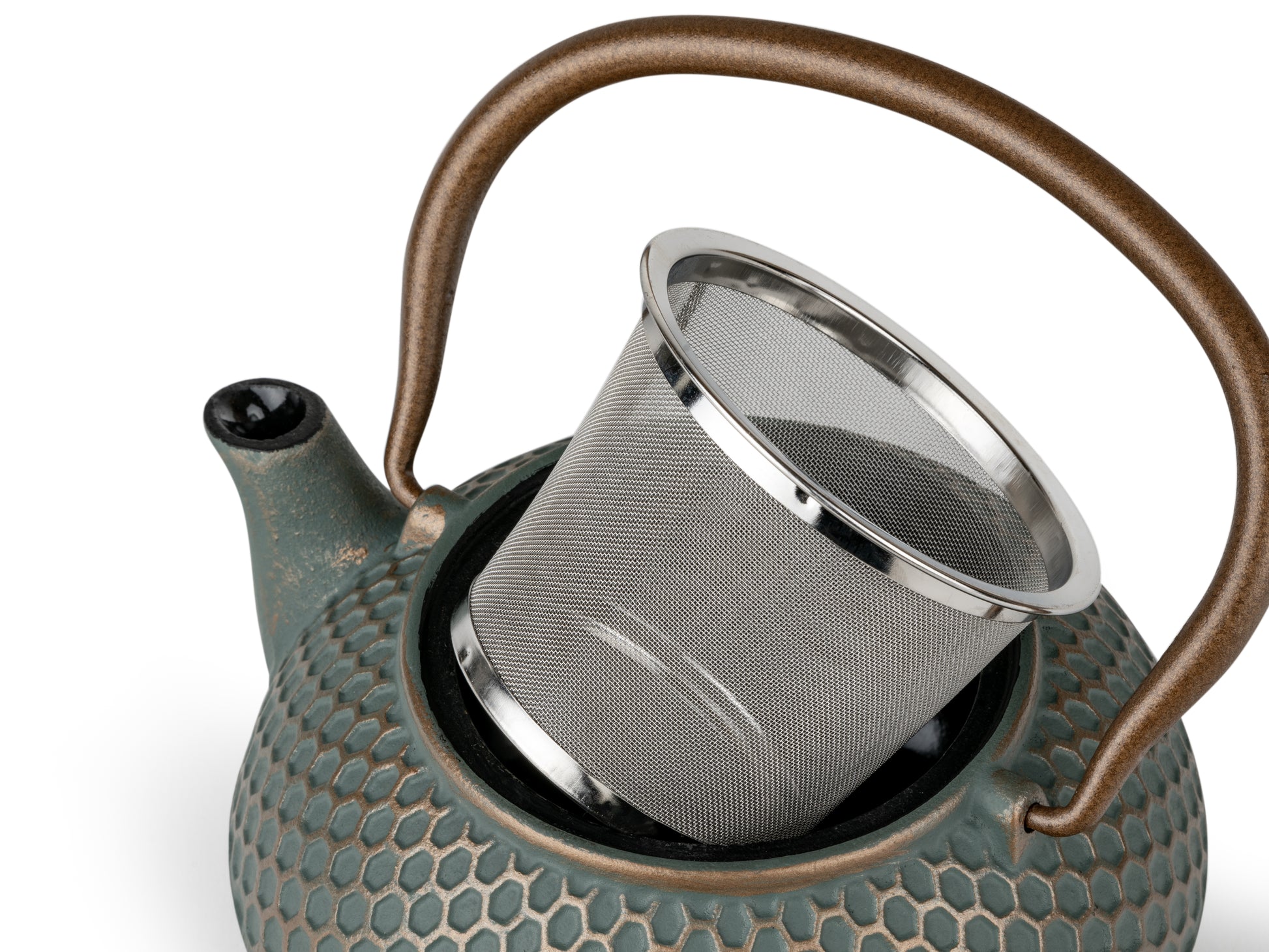 Teapot with a metal filter on a white background