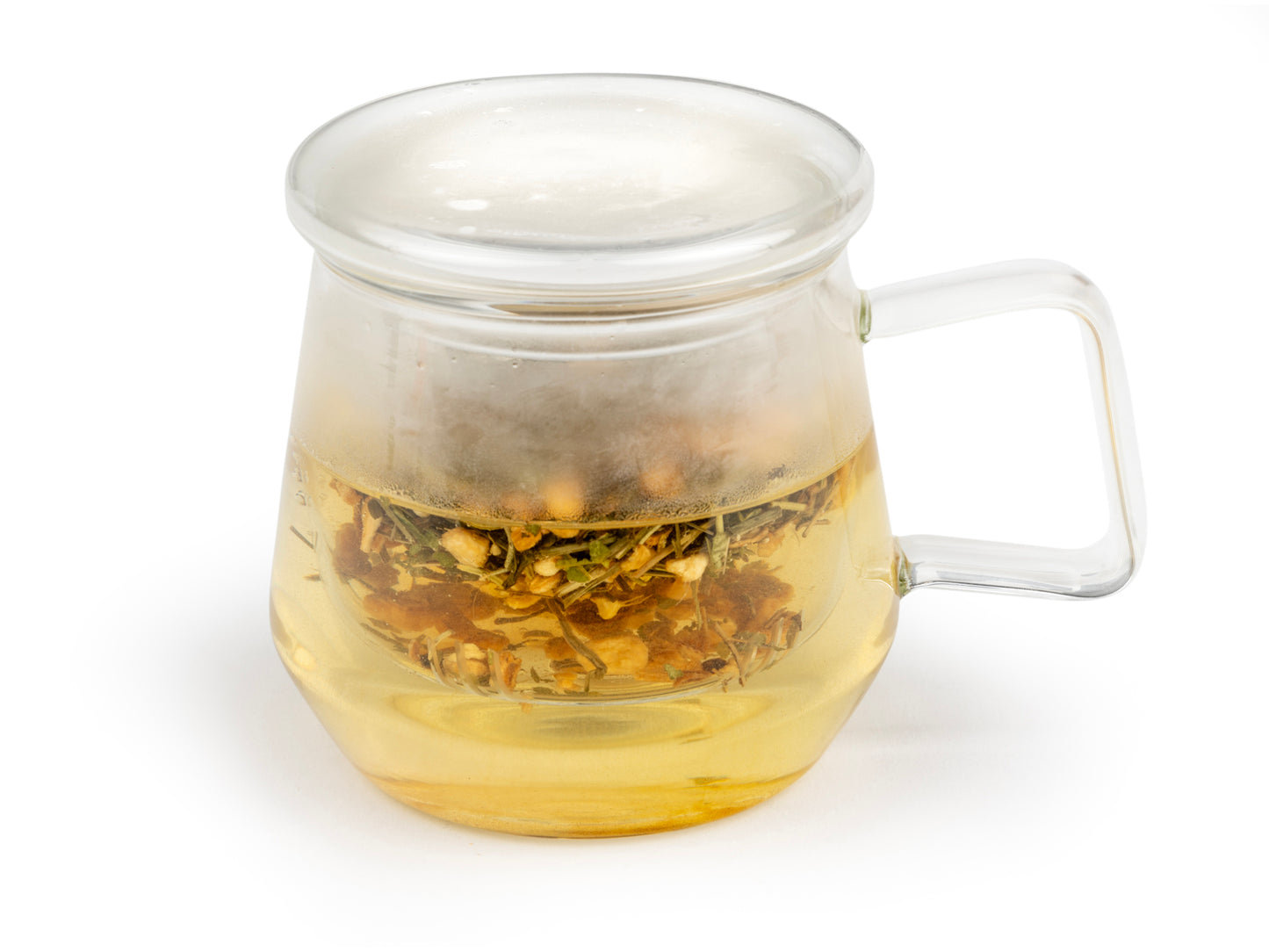 Clear glass mug with handle with lid and glass infuser filled with brewing tea leaves on a white background.