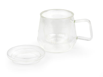 Clear glass mug with glass infuser and lid on a white background