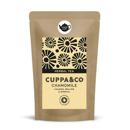 A small brown pouch with pale yellow and black label with product information 'HERBAL TEA CUPPA & CO CHAMOMILE'