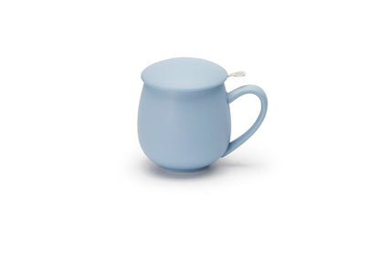 Light blue porcelain mug with a lid on a white background