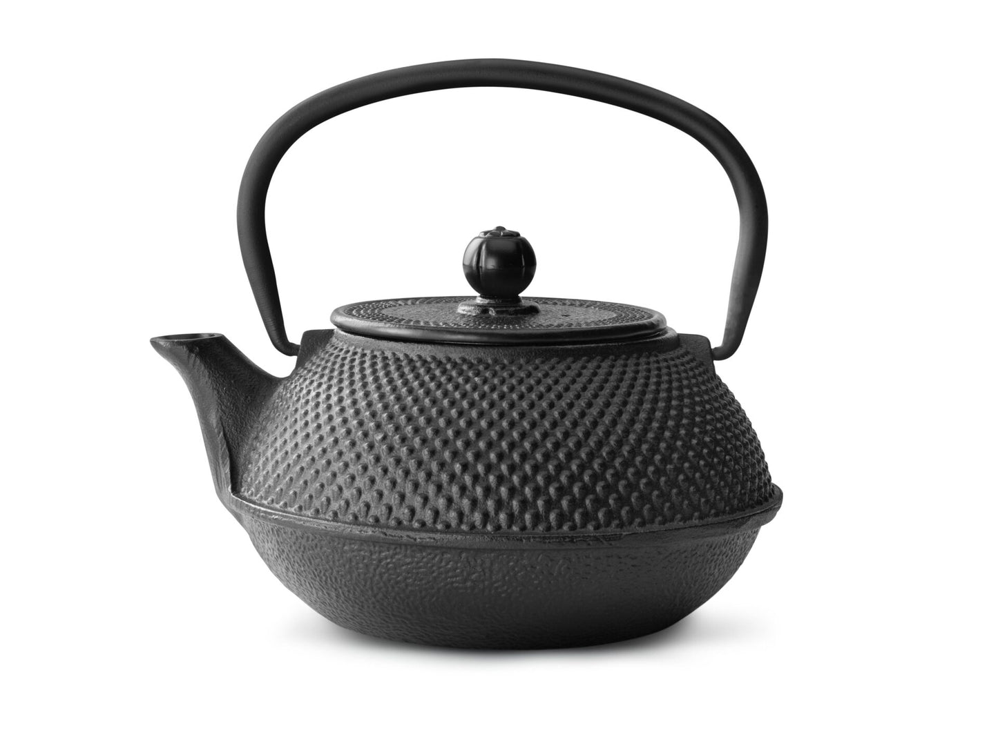Black textured cast iron teapot on a white background