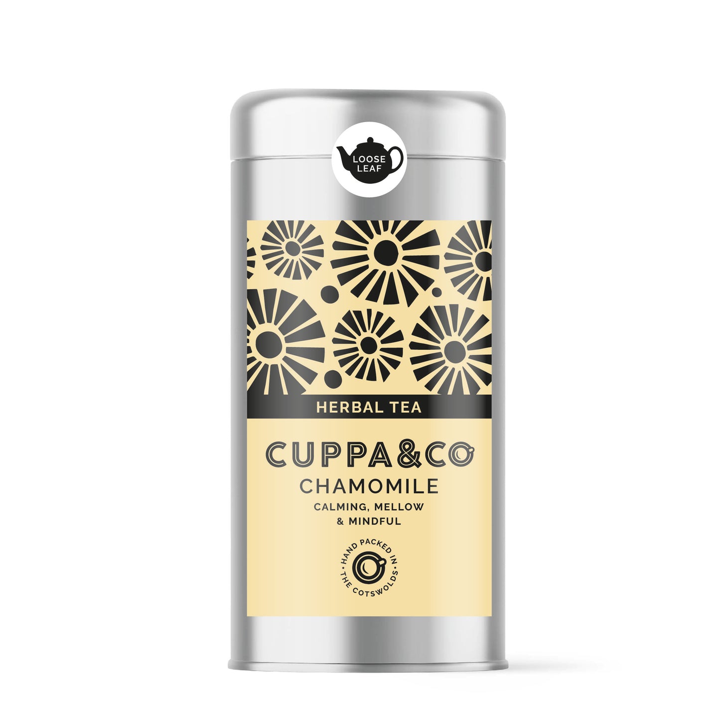 Silver tea caddy with pale yellow and black label with product information 'HERBAL TEA CUPPA & CO CHAMOMILE'