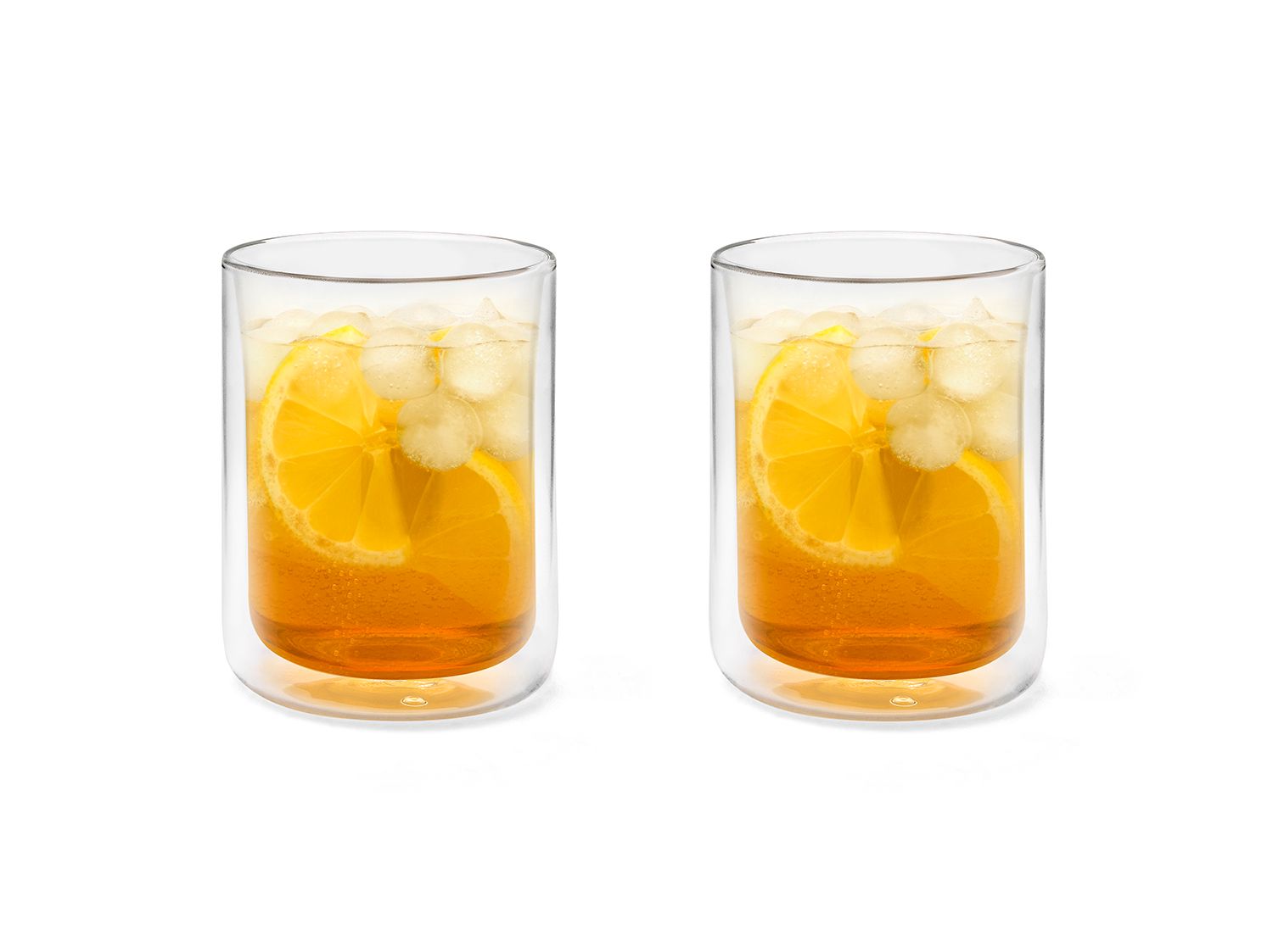 Two clear glass tumblers of iced tea with lemon slices on a white background