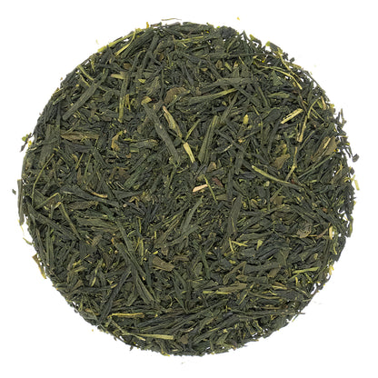 Vibrant green loose leaf Gyokuro tea on a white background