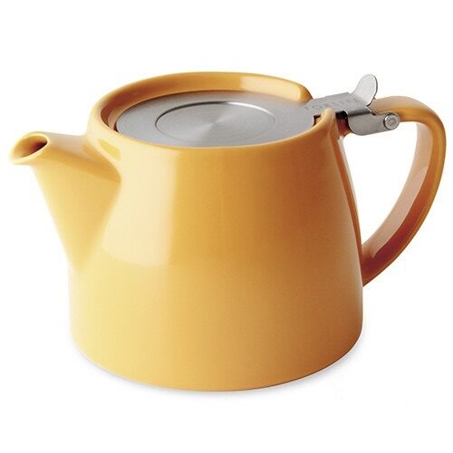 Tangerine orange/yellow infuser teapot with a silver lid on a white background