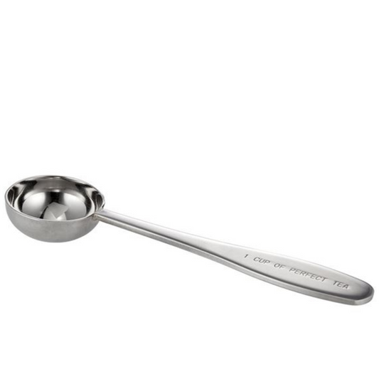 Stainless steel tea spoon with '1 cup of perfect tea' text on the handle